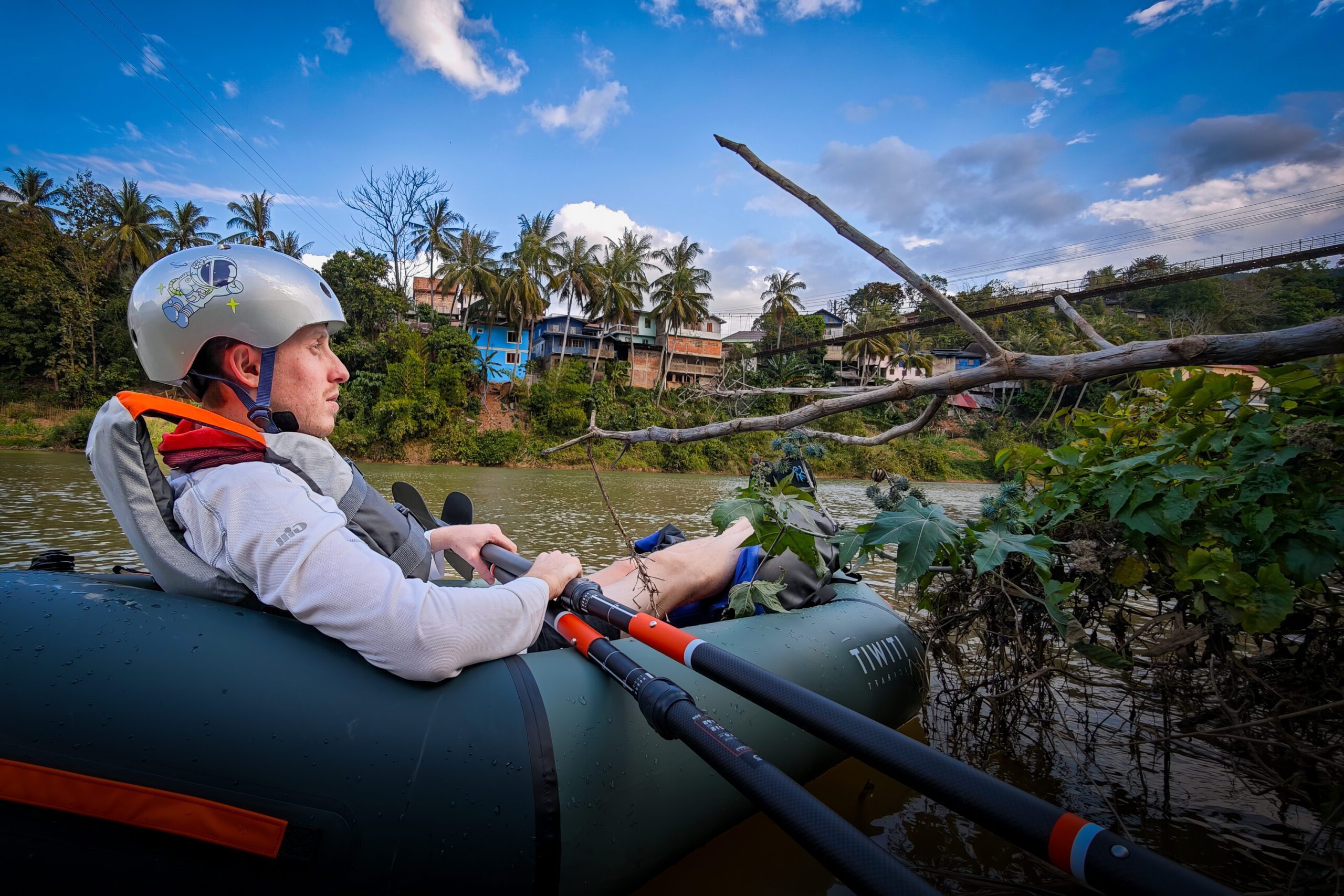 Relaxing on the Nam Ou river in Northern Laos on a Pack Raft
