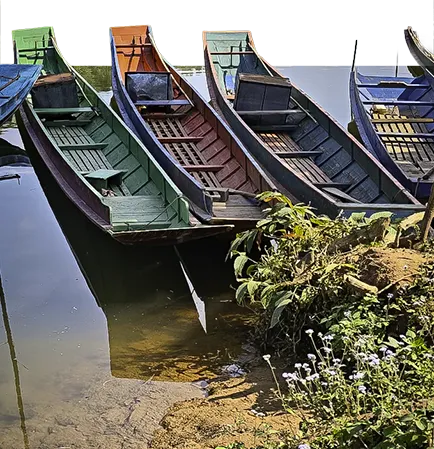 boats moored riverside on the nam ou