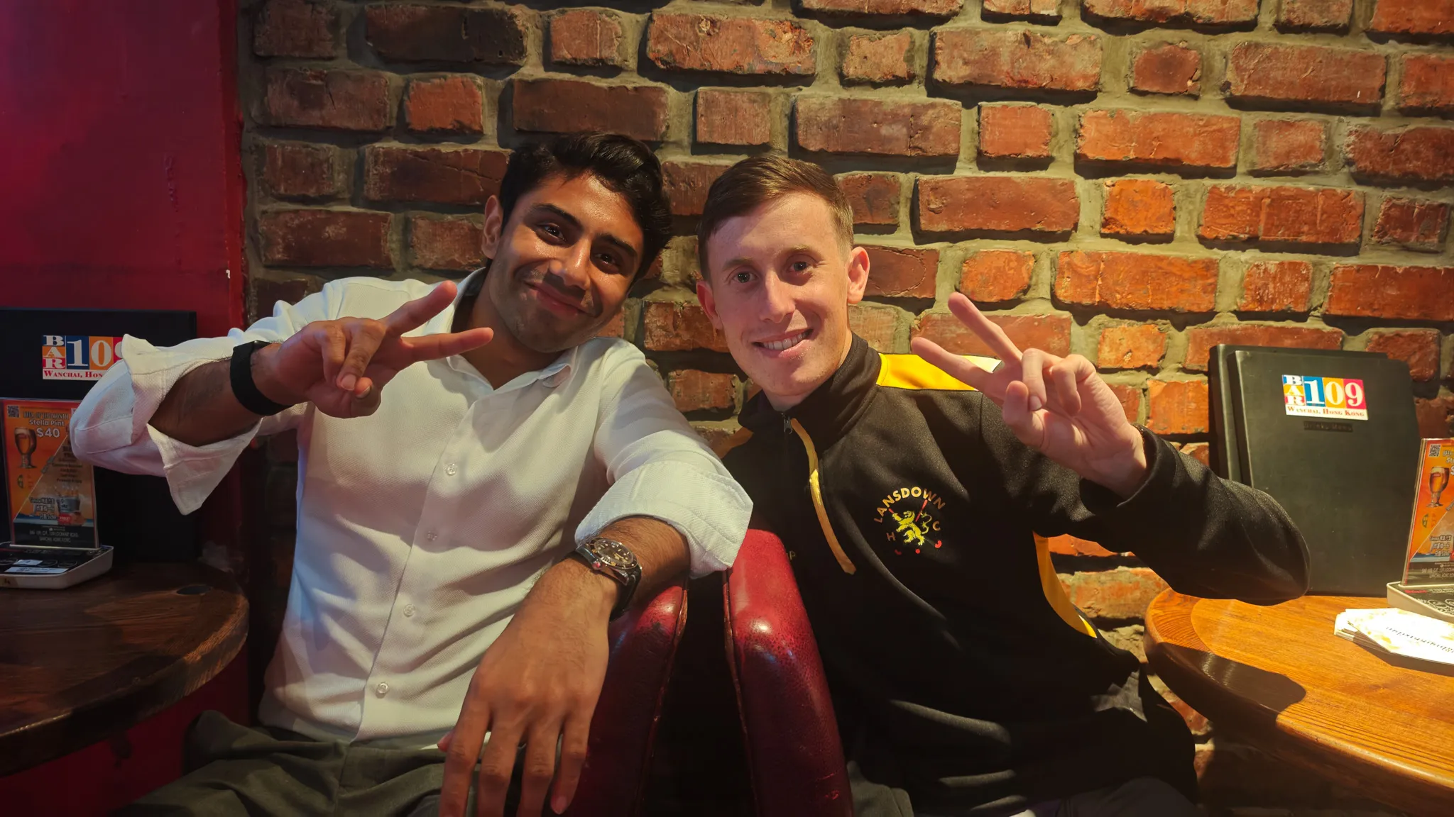 Late night at a small food stall inside Chungking Mansions with a Coca-Cola can and the kitchen counter behind