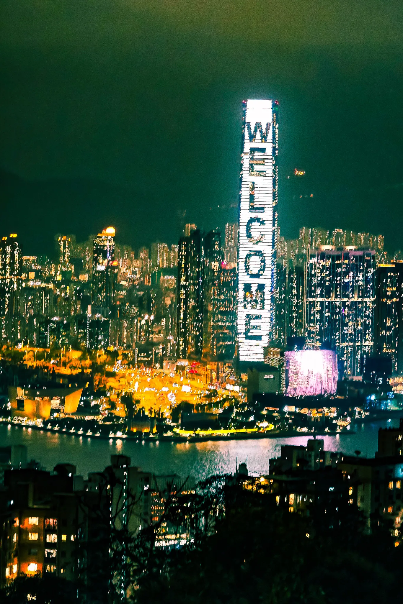 Hang Seng Bank ATM machine in Hong Kong showing the welcome screen during a late-night cash withdrawal adventure