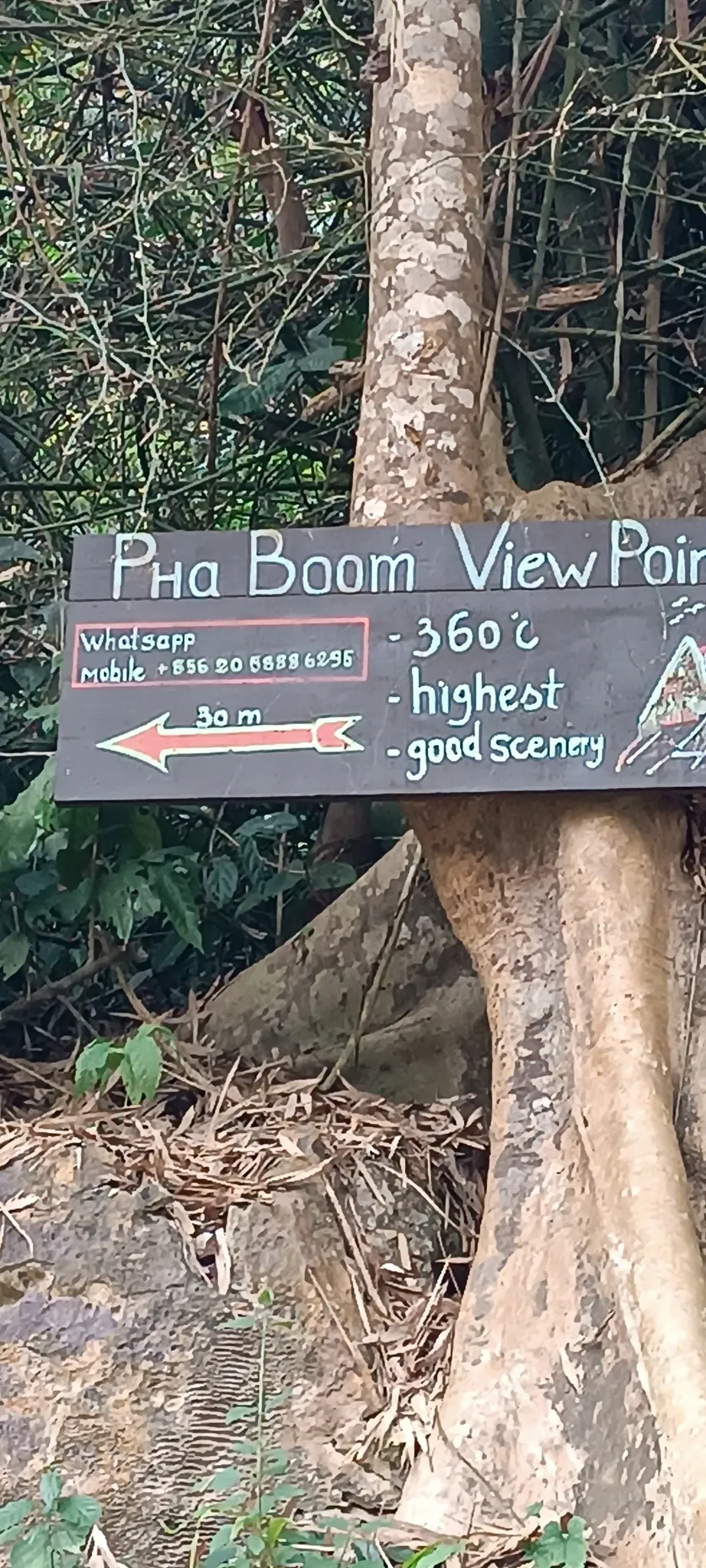 Close-up of the Pha Boom View Point sign showing 360 degree views, highest point, and good scenery
